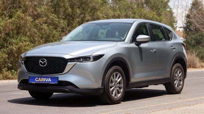 Used Mazda CX-5 II Facelift, 2.5 l, 2023 in Dubai by Cariva Used Cars , Silver color. GCC Specs | AUTO.AE