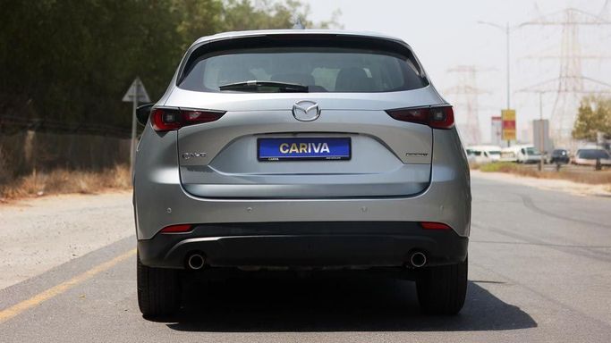 Used Mazda CX-5 II Facelift, 2.5 l, 2023 in Dubai by Cariva Used Cars , Silver color. GCC Specs | AUTO.AE