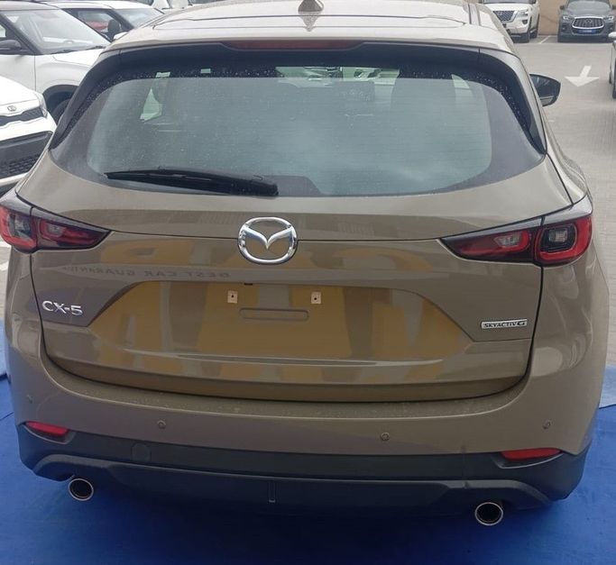Подержанный Mazda CX-5 II Рестайлинг, 2.5 л, 2025 в Дубае от Cariva Used Cars  Бежевый цвет. GCC | AUTO.AE