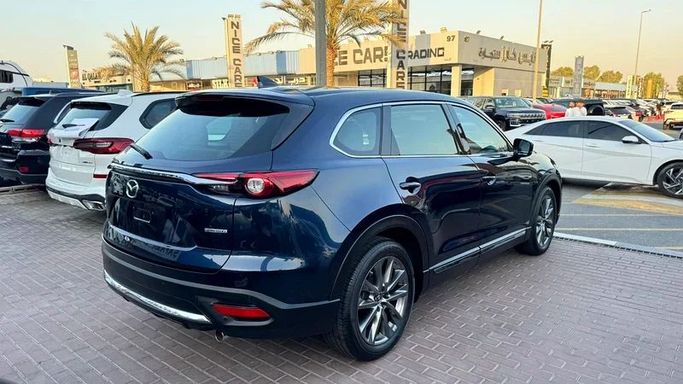 Used Mazda CX-9 II, 2.5 l, 2021 in Dubai by Ignite Used Cars, Black color. GCC Specs | AUTO.AE
