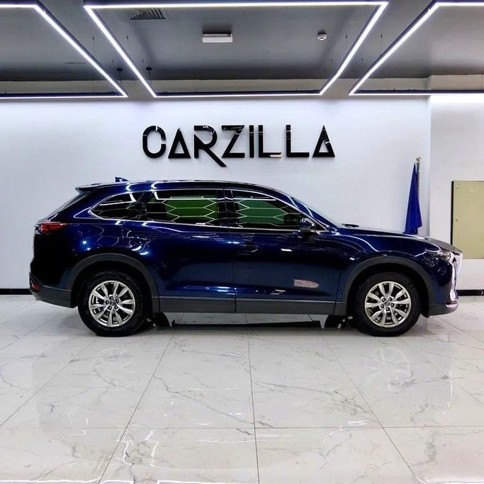 Used Mazda CX-9 II, 2.5 l, 2017 in Dubai by Carzilla Motors, Blue color. GCC Specs | AUTO.AE
