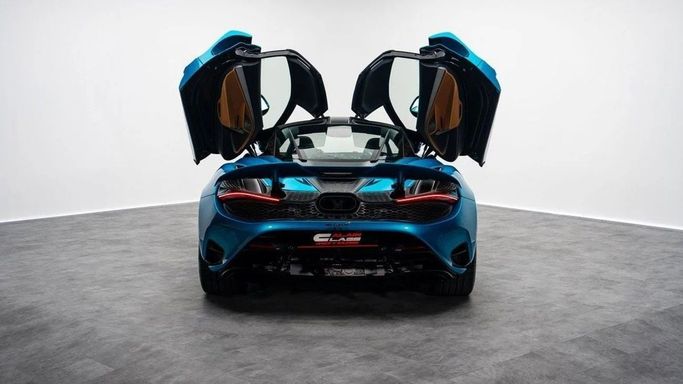 New McLaren 750S, 4.0 l, 2024 in Dubai by Al Ain Class Motors, Blue color. GCC Specs | AUTO.AE
