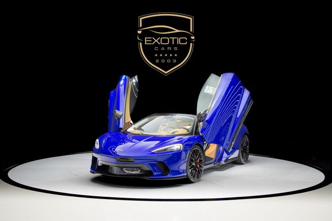 New McLaren GT, 4.0 l, 2023 in Dubai by Exotic Cars, Blue color. GCC Specs | AUTO.AE