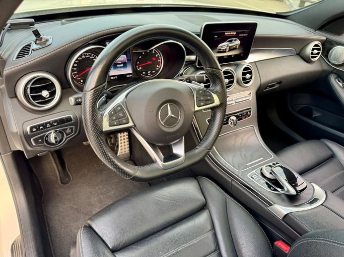 Подержанный Mercedes-Benz C-Class AMG 43 AMG IV (W205), 3.0 л, 2016 в Дубае от Saeed Auto Белый цвет. Японская | AUTO.AE