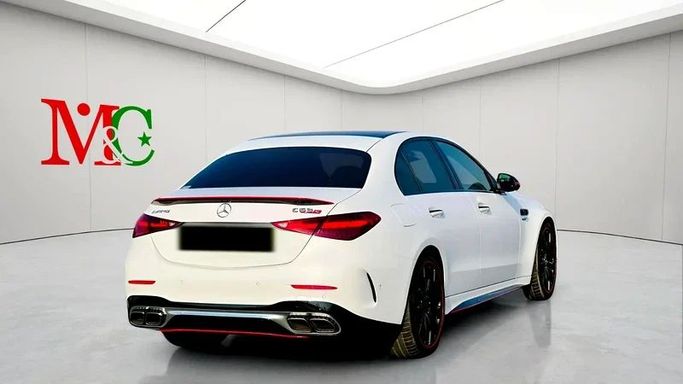 Подержанный Mercedes-Benz C-Class AMG 63 AMG S E Performance V (W206), 2.0 л, 2024 в Дубае от Mirza Automobile FZE Белый цвет. Японская | AUTO.AE