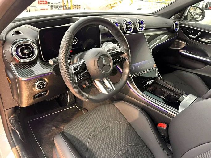 Подержанный Mercedes-Benz C-Class AMG 63 AMG S E Performance V (W206), 2.0 л, 2024 в Дубае от Mirza Automobile FZE Белый цвет. Японская | AUTO.AE