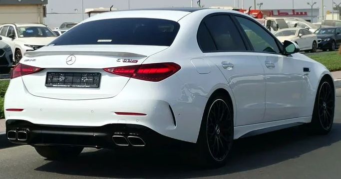 Подержанный Mercedes-Benz C-Class AMG 63 AMG S E Performance V (W206), 2.0 л, 2024 в Дубае от Mirza Automobile FZE Белый цвет. Японская | AUTO.AE