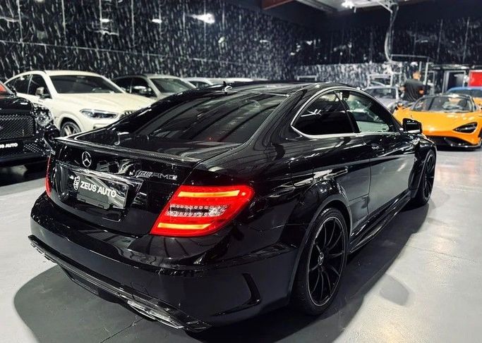 Used Mercedes-Benz C-Class AMG 63 AMG Performance III (W204) Facelift, 6.2 l, 2013 in Dubai by Zeus Motors, Black color. Japanese Specs | AUTO.AE