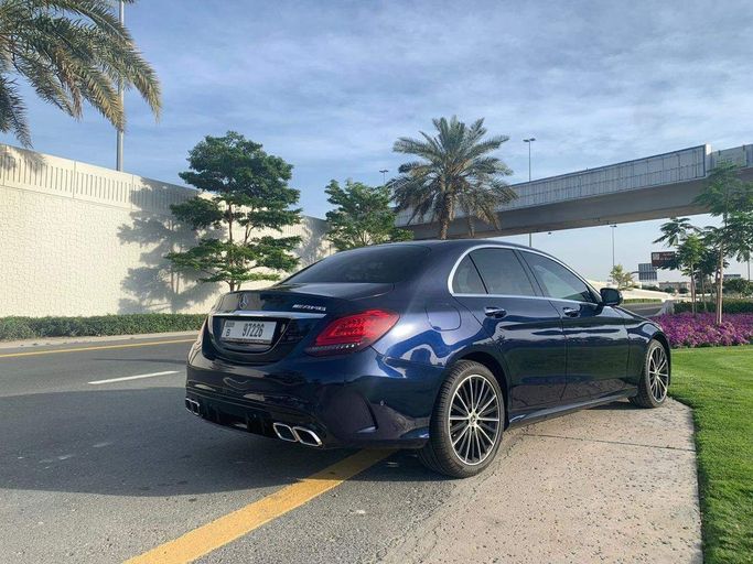 Mercedes-Benz C-Class 300 V (W206), 2021 седан стандарт класса в Дубае от JON Luxury Car Rental LLC синий цвет | AUTO.AE