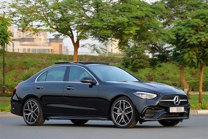Mercedes-Benz C-Class 300 V (W206), 2022 седан стандарт класса в Дубае от King Way Car Rental черный цвет | AUTO.AE