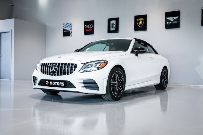 Used Mercedes-Benz C-Class 300 IV (W205) Facelift, 2.0 l, 2021 in Dubai by C7 Motors, White color. American Specs | AUTO.AE