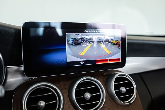 Used Mercedes-Benz C-Class 300 IV (W205) Facelift, 2.0 l, 2021 in Dubai by C7 Motors, White color. American Specs | AUTO.AE