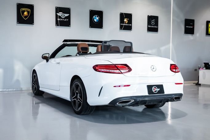 Used Mercedes-Benz C-Class 300 IV (W205) Facelift, 2.0 l, 2021 in Dubai by C7 Motors, White color. American Specs | AUTO.AE