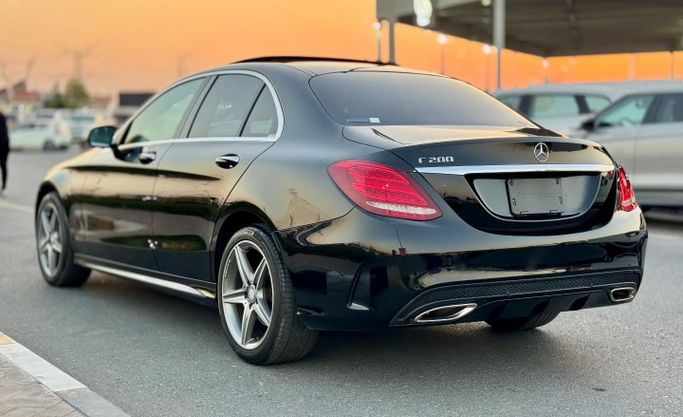 Used Mercedes-Benz C-Class 200 IV (W205), 2.0 l, 2016 in Dubai by Saeed Auto, Black color. Japanese Specs | AUTO.AE
