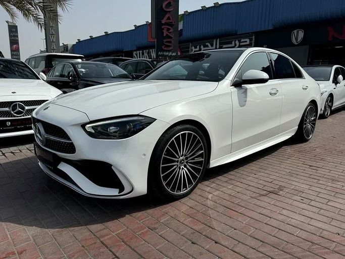 Подержанный Mercedes-Benz C-Class 200 V (W206), 1.5 л, 2023 в Дубае от Nice Cars Motos Белый цвет. GCC | AUTO.AE