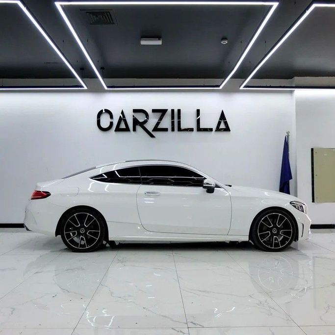 Used Mercedes-Benz C-Class 300 IV (W205) Facelift, 2.0 l, 2019 in Dubai by Carzilla Motors, White color. GCC Specs | AUTO.AE