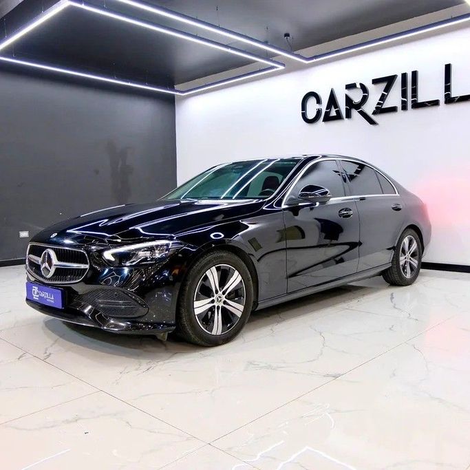 Used Mercedes-Benz C-Class 200 V (W206), 2.0 l, 2022 in Dubai by Carzilla Motors, Black color. Korean Specs | AUTO.AE