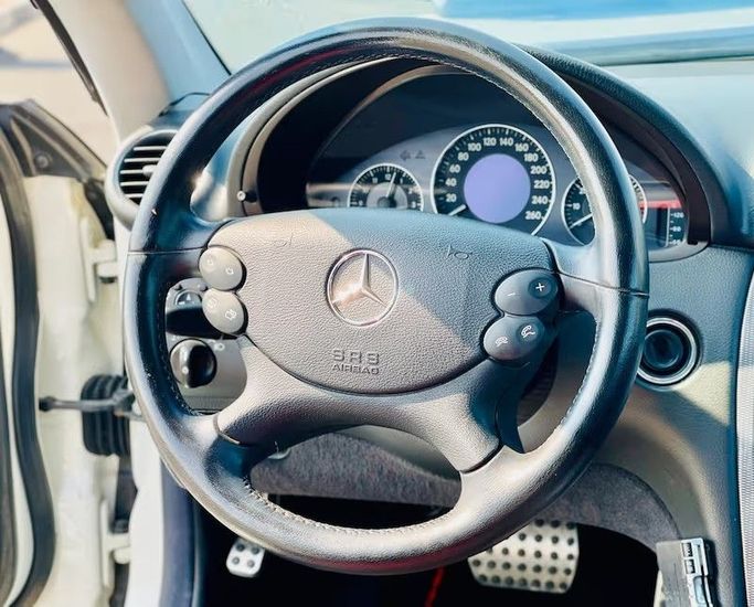 Used Mercedes-Benz CLK-Class 320 I (W208) Facelift, 3.2 l, 2003 in Dubai by Al Abbas Motors, White color. Japanese Specs | AUTO.AE
