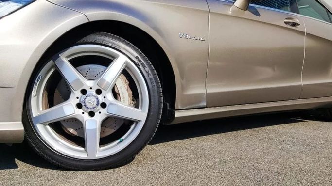 Used Mercedes-Benz CLS AMG 63 AMG II (W218) Facelift, 5.5 l, 2014 in Dubai by Ideal Cars LLC, Brown color. GCC Specs | AUTO.AE