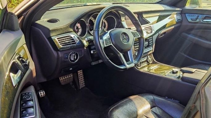 Used Mercedes-Benz CLS AMG 63 AMG II (W218) Facelift, 5.5 l, 2014 in Dubai by Ideal Cars LLC, Brown color. GCC Specs | AUTO.AE