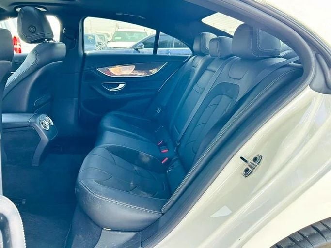 Подержанный Mercedes-Benz CLS AMG 53 AMG III (C257), 3.0 л, 2019 в Дубае от Mirza Automobile FZE Белый цвет. Японская | AUTO.AE