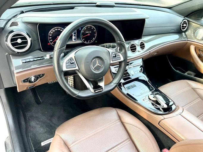 Подержанный Mercedes-Benz E-Class AMG 43 AMG V (W213), 3.0 л, 2018 в Дубае от Saeed Auto Белый цвет. Японская | AUTO.AE