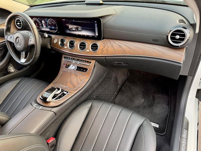 Used Mercedes-Benz E-Class 400 V (W213, S213, C238), 3.0 l, 2018 in Dubai by Saeed Auto, White color. Japanese Specs | AUTO.AE