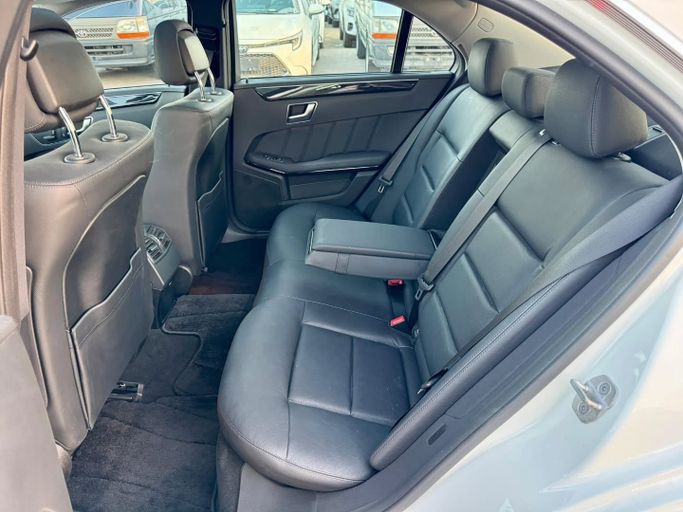 Used Mercedes-Benz E-Class 350 IV (W212, S212, C207) Facelift, 3.5 l, 2013 in Dubai by Saeed Auto, White color. Japanese Specs | AUTO.AE