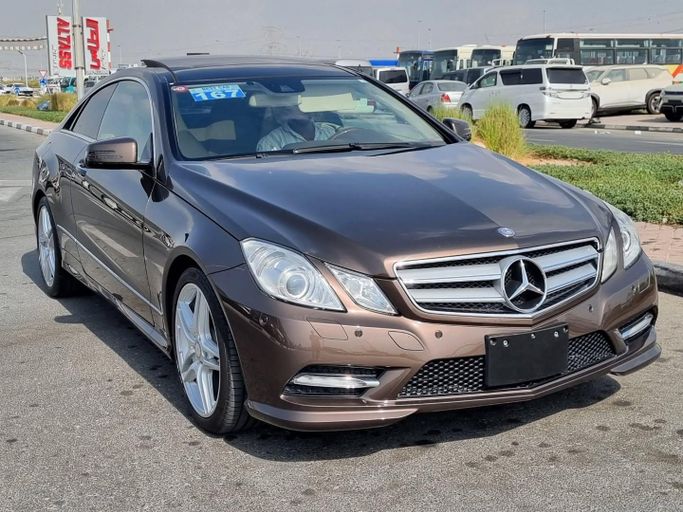 Used Mercedes-Benz E-Class 350 IV (W212, S212, C207) Facelift, 3.5 l, 2013 in Dubai by Saeed Auto, Maroon color. Japanese Specs | AUTO.AE