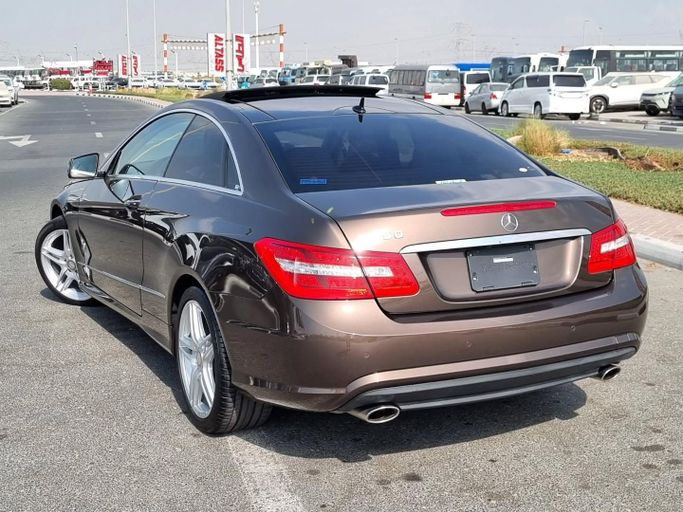 Used Mercedes-Benz E-Class 350 IV (W212, S212, C207) Facelift, 3.5 l, 2013 in Dubai by Saeed Auto, Maroon color. Japanese Specs | AUTO.AE