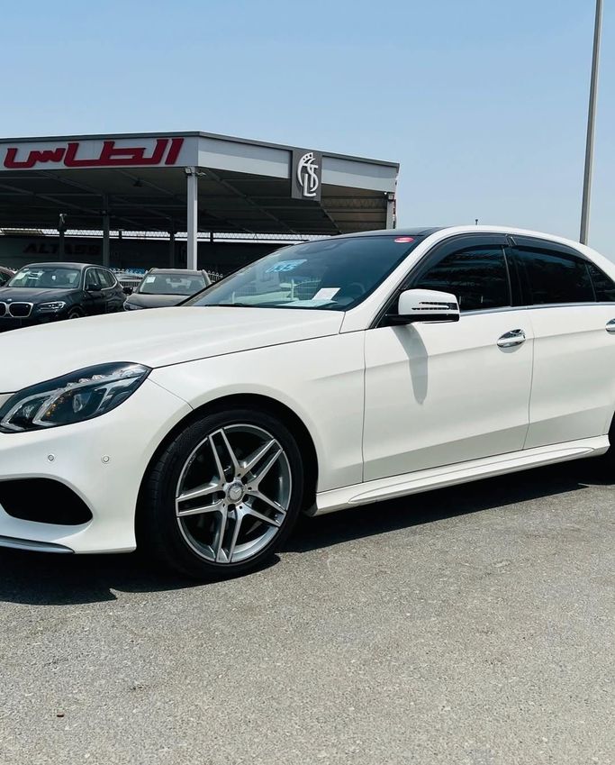 Подержанный Mercedes-Benz E-Class 300 IV (W212, S212, C207) Рестайлинг, 3.5 л, 2015 в Дубае от Lakhani Motors Белый цвет. Японская | AUTO.AE
