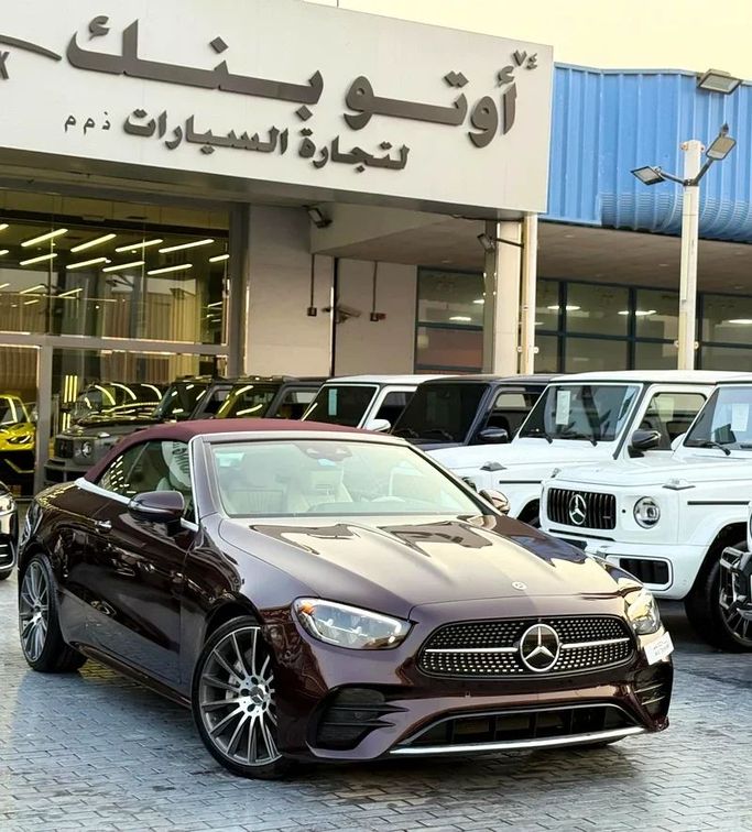 Used Mercedes-Benz E-Class 450 V (W213, S213, C238) Facelift, 3.0 l, 2023 in Dubai by Auto Bank Motors, Burgundy color. American Specs | AUTO.AE