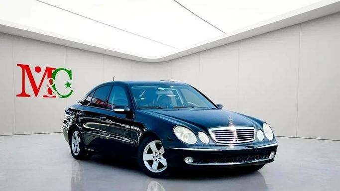 Подержанный Mercedes-Benz E-Class 320 III (W211, S211), 3.2 л, 2004 в Дубае от Mirza Automobile FZE Черный цвет. Японская | AUTO.AE