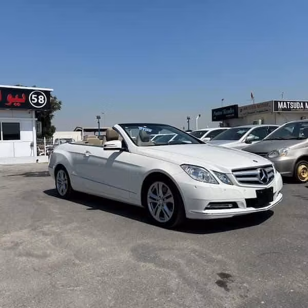 Used Mercedes-Benz E-Class 350 IV (W212, S212, C207), 3.5 l, 2011 in Dubai by New NS Motors, White color. Japanese Specs | AUTO.AE