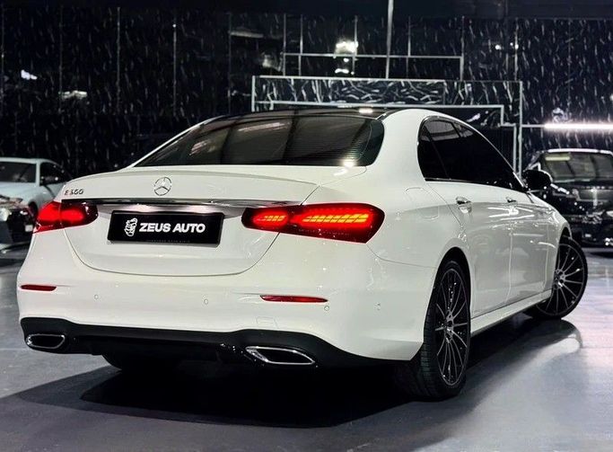 Used Mercedes-Benz E-Class 300 V (W213, S213, C238) Facelift, 2.0 l, 2023 in Dubai by Zeus Motors, White color. GCC Specs | AUTO.AE