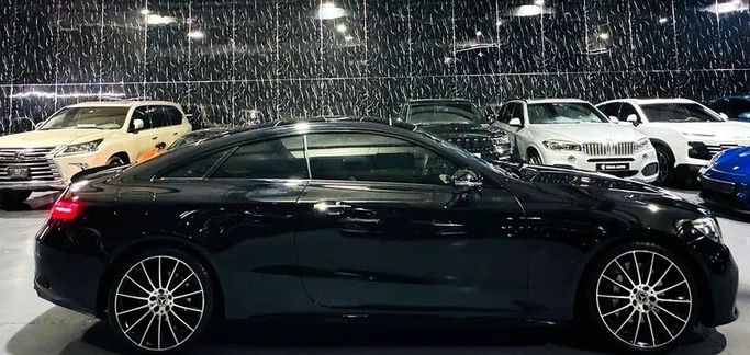 Used Mercedes-Benz E-Class 300 V (W213, S213, C238) Facelift, 2.0 l, 2022 in Dubai by Zeus Motors, Black color. GCC Specs | AUTO.AE