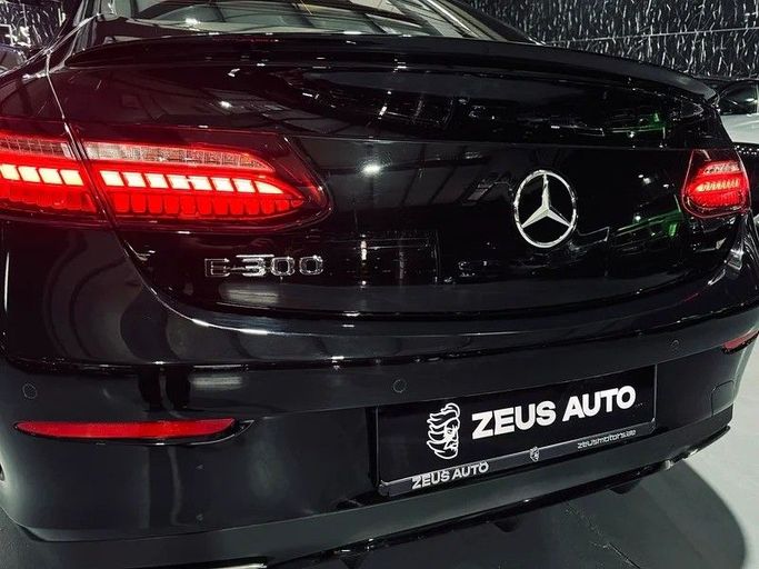 Used Mercedes-Benz E-Class 300 V (W213, S213, C238) Facelift, 2.0 l, 2022 in Dubai by Zeus Motors, Black color. GCC Specs | AUTO.AE