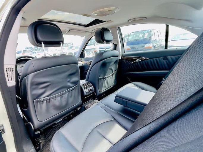 Used Mercedes-Benz E-Class 350 III (W211, S211) Facelift, 3.5 l, 2007 in Dubai by Al Abbas Motors, White color. Japanese Specs | AUTO.AE