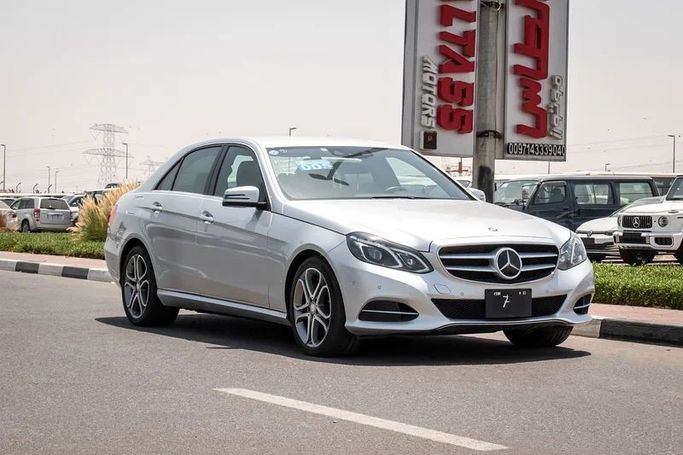 Подержанный Mercedes-Benz E-Class 400 Hybrid IV (W212, S212, C207) Рестайлинг, 3.5 л, 2013 в Дубае от Tokuso Motors FZCO Серебристый цвет. Японская | AUTO.AE