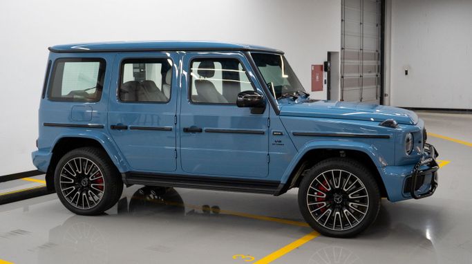 Mercedes-Benz G-Class AMG 63 AMG II (W463), 2025 business suv 5 dr. for rent in Dubai by DEIZ, light blue color | AUTO.AE