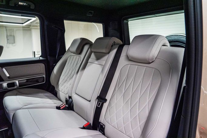 New Mercedes-Benz G-Class AMG 63 AMG II (W465) Facelift, 4.0 l, 2025 in Dubai by PUPIL OF FATE MOTORS, Beige color. GCC Specs | AUTO.AE