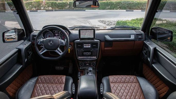 Подержанный Mercedes-Benz G-Class AMG 63 AMG I (W463) Рестайлинг 3, 5.5 л, 2016 в Дубае от Dresden Motors Черный цвет. GCC | AUTO.AE