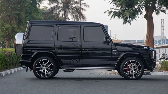 Подержанный Mercedes-Benz G-Class AMG 63 AMG I (W463) Рестайлинг 3, 5.5 л, 2016 в Дубае от Dresden Motors Черный цвет. GCC | AUTO.AE