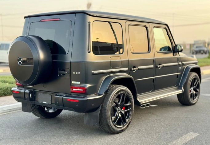 Подержанный Mercedes-Benz G-Class AMG 63 AMG II (W463), 4.0 л, 2023 в Дубае от Saeed Auto Черный цвет. Японская | AUTO.AE