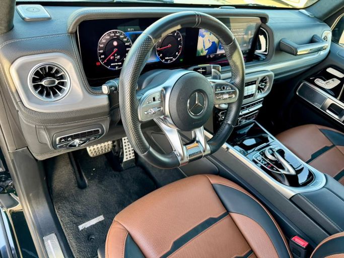 Подержанный Mercedes-Benz G-Class AMG 63 AMG II (W463), 4.0 л, 2019 в Дубае от Saeed Auto Зеленый цвет. Японская | AUTO.AE