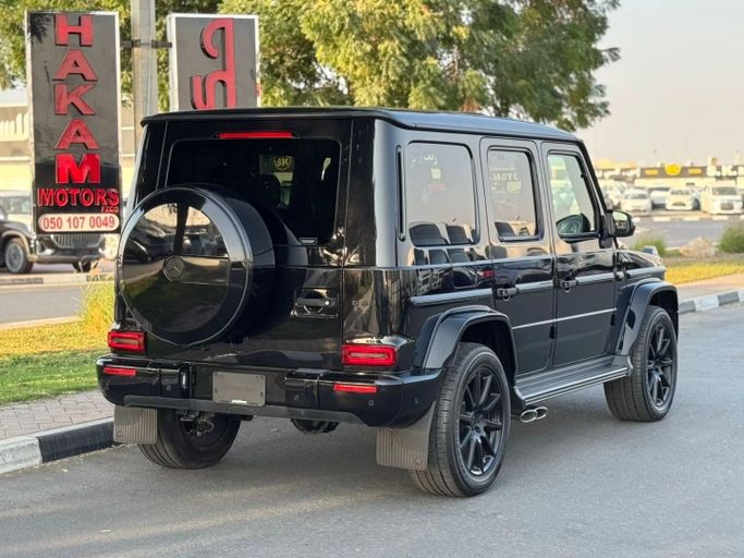 Подержанный Mercedes-Benz G-Class AMG 63 AMG II (W463), 4.0 л, 2023 в Дубае от Saeed Auto Черный цвет. Японская | AUTO.AE