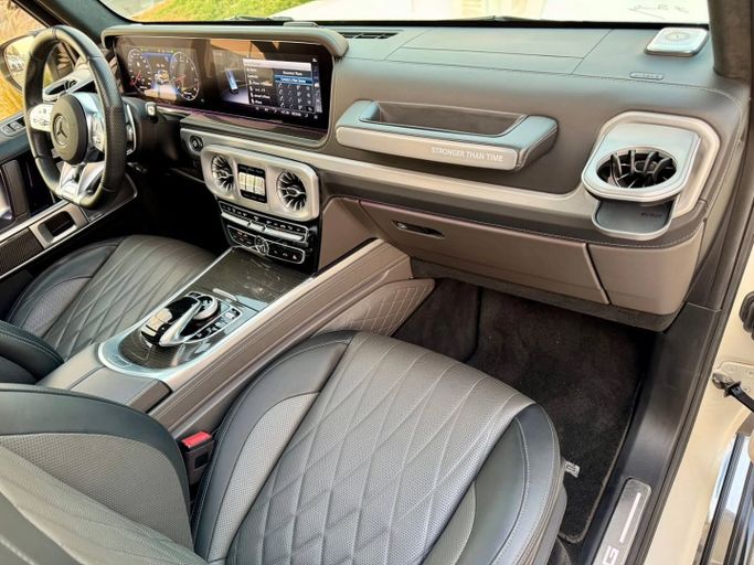 Подержанный Mercedes-Benz G-Class AMG 63 AMG II (W463), 4.0 л, 2021 в Дубае от Saeed Auto Белый цвет. Японская | AUTO.AE