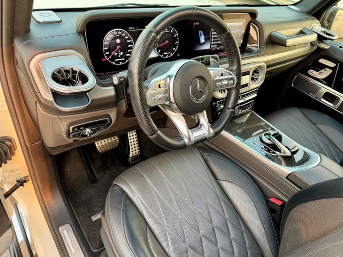 Подержанный Mercedes-Benz G-Class AMG 63 AMG II (W463), 4.0 л, 2021 в Дубае от Saeed Auto Белый цвет. Японская | AUTO.AE
