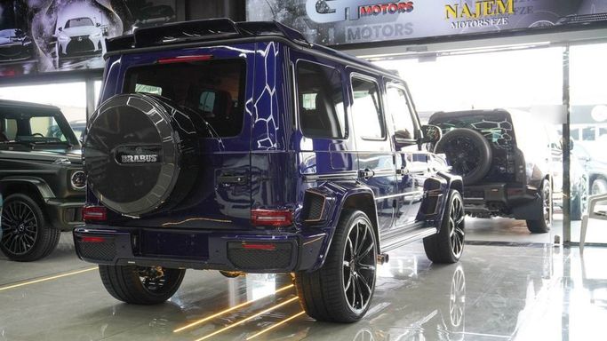 Новый Mercedes-Benz G-Class AMG Brabus 800 II (W463), 4.0 л, 2023 в Дубае от Najem Motors Синий цвет. Европейская | AUTO.AE