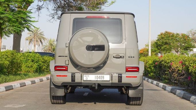 Подержанный Mercedes-Benz G-Class AMG 63 AMG II (W463), 4.0 л, 2021 в Дубае от Najem Motors Серый цвет. GCC | AUTO.AE